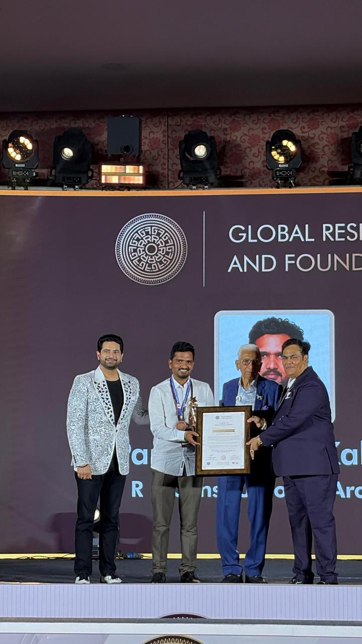 Award presentation ceremony on stage at National Prestige Award 2026