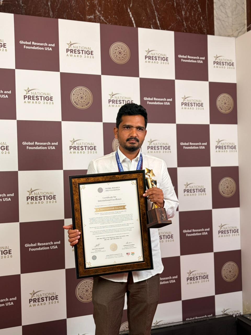 Er. Panchakshari Kalasad with Certificate for International Excellence and trophy